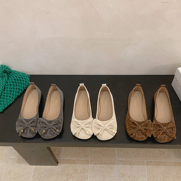Grey, Beige and Brown fabric bow flats displayed in three pairs