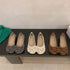 Grey, Beige and Brown fabric bow flats displayed in three pairs