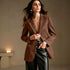 Brown brushed-finish blazer with long sleeves and flap pockets