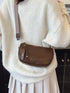 Coffee brown bag worn across the body with wide patterned strap