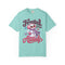 Frosted with Attitude Comfort Colors tee in Chalky Mint, front view with snowwoman, pink earmuffs, sunglasses and lavender scarf