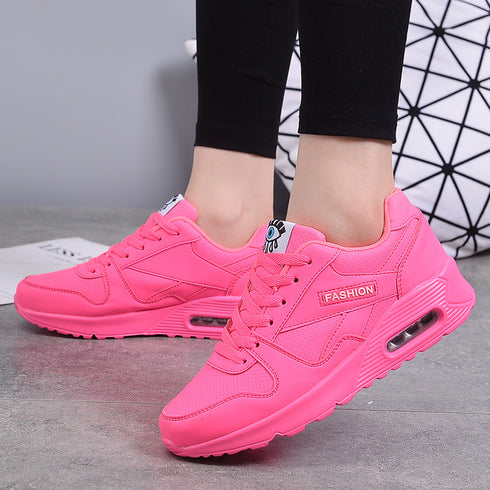 Dark Pink lace-up platform sneakers modeled in side view
