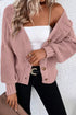 Dusty Pink textured cardigan worn over a white camisole