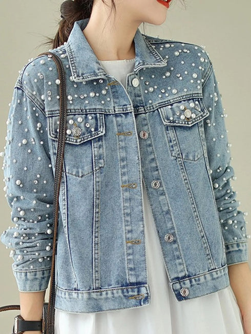 Light-blue embellished jacket showing button front and chest pockets