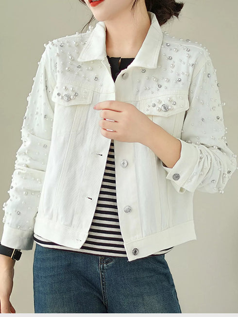 White embellished jacket showing front chest pockets