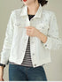 White embellished jacket showing front chest pockets