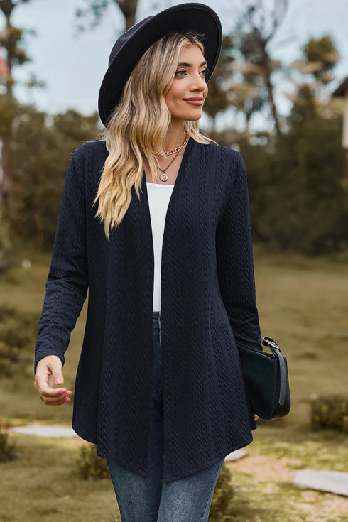 Front angled view of dark blue textured cardigan