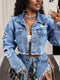 Blue distressed cropped denim jacket with raw hem for women