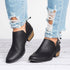 Black ankle booties with back tassel zipper pulls