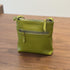 Back view of green RockCow T25017 bag showing the horizontal zip pocket