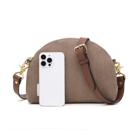 Chocolate Hopper bag beside a phone for visual size reference