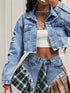 Blue distressed cropped denim jacket with raw hem for women