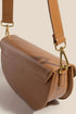 Side view of camel crescent crossbody with strap attachment