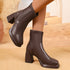 Brown square-toe ankle boots shown from two side angles