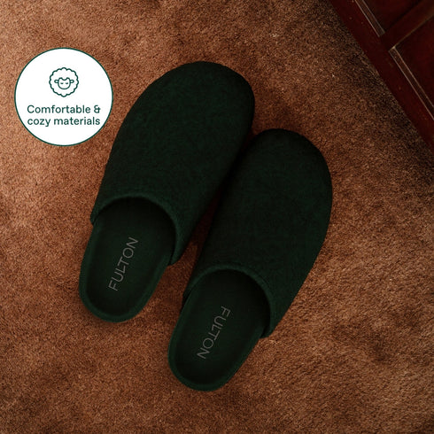 Top view of Forest Green Fulton House Shoes resting on a brown floor