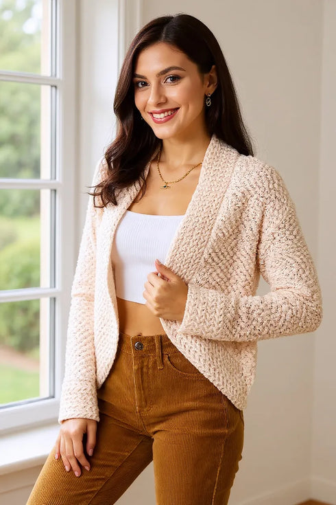 Cream Double Take textured open-front cardigan worn beside a window, front view