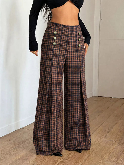 Brown plaid wide-leg pants worn with a black crop top