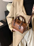Vintage-inspired mini barrel crossbody bag — product image 2