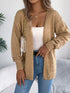Khaki crochet-knit cardigan, seated view with the open front visible