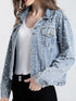 Side-front view of light-blue denim jacket with embellished sleeve