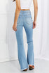 Jess light-wash flare jeans with back patch pockets, rear view