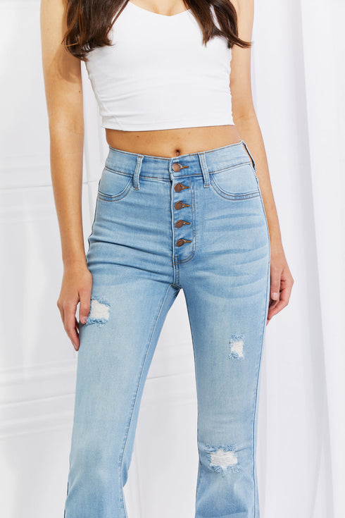 Close-up of five-button front and high waist on light-blue Jess jeans