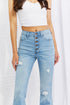 Close-up of five-button front and high waist on light-blue Jess jeans