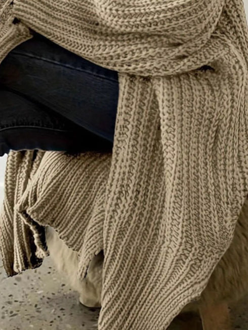 Close view of Khaki cardigan knit texture and sleeve