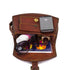 Bennett crossbody open to show interior storage and front snap pocket