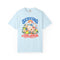 Chambray blue Serving a Little Attitude tee, front view with tennis goose, racket, tennis balls and daisies