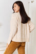 Back view of cream Double Take cardigan showing knit texture