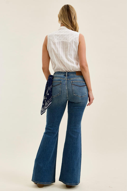 Back view of medium-wash jeans with bandana loop detail