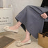 Side view of beige slip-on bow flats