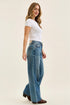 Three-quarter front view of Judy Blue Wilhelmina jeans with hands near the pockets