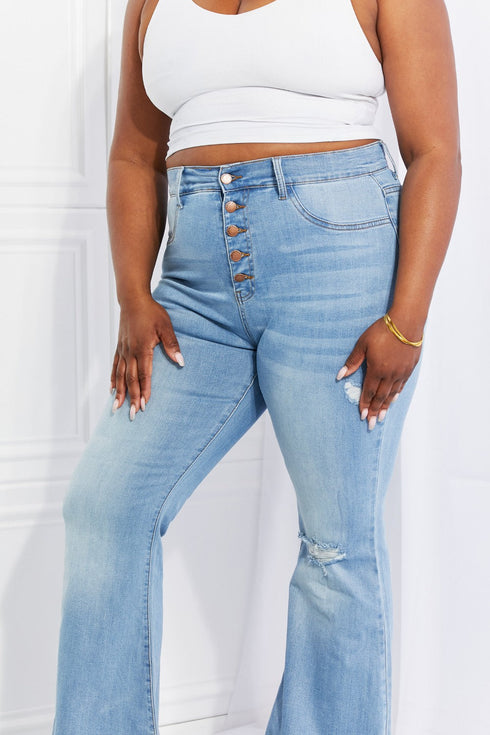Jess plus-size jeans showing button fly and front distressing