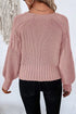 Back view of Dusty Pink cardigan with long textured sleeves