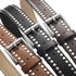 Close-up of studded belt edges and alloy buckles