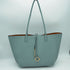 Light blue Kendra reversible tote with a brown interior — gallery image 16