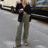 Army-green relaxed cargo pants worn with a black shirt