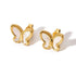 Angled pair of butterfly studs with gold-tone frames and posts