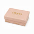 Blush Dloria jewelry gift box with gold lettering on the lid