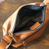Open RockCow bag showing interior compartments and zipper