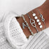 Gray bead and silver-tone bracelet stack with love and heart details