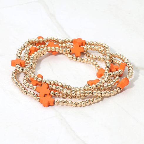 Orange cross-accent five-piece stretch bracelet set with gold-tone beads