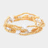 White cross-accent five-piece stretch bracelet set with gold-tone beads