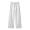 White wide-leg drawstring pants displayed flat, front view