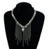 Chain-fringe necklace with pointed heart shown on a black jewelry bust
