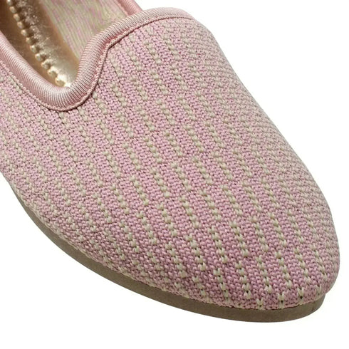 Close-up of pink knit-textured upper and rounded toe