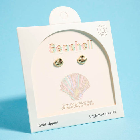 Gold-dipped mini seashell stud earrings displayed on a seashell jewelry card