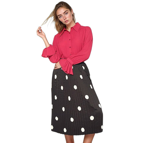 Pleione pleated polka-dot midi skirt styled with a pink blouse